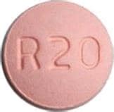 Find detailed information on your pill including uses, side effects, and interactions. . Round pink pill 20
